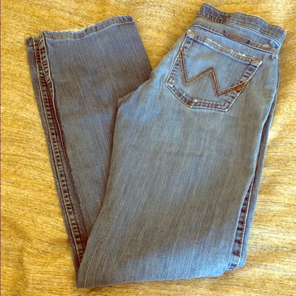 Distressed wrangler jeans